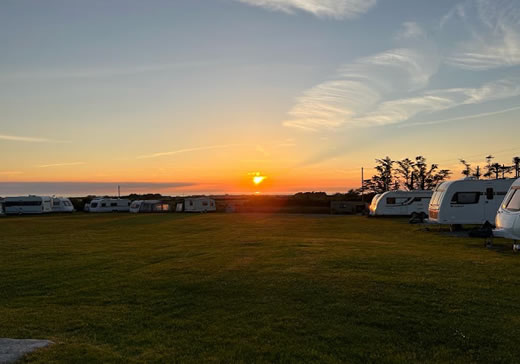 Sunset over Bryn Llan Campsite