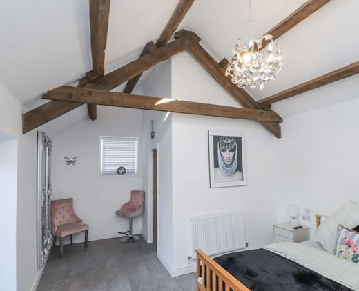 Upstairs Bedroom with large mirror