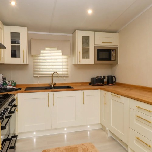 Kitchen and accommodation at The Chalet at Tyn Lon