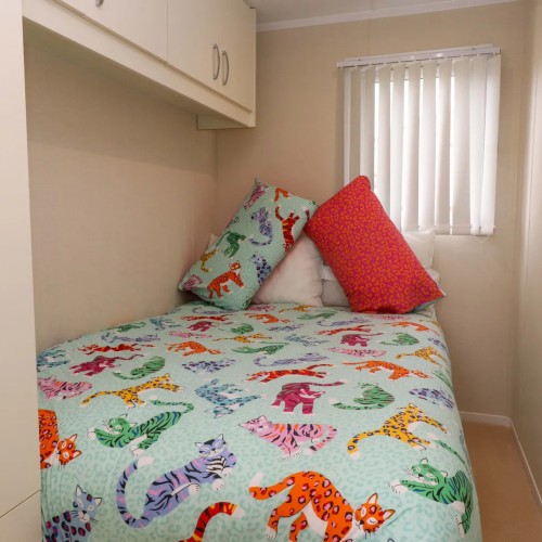 Bedroom accommodation at The Chalet at Tyn Lon